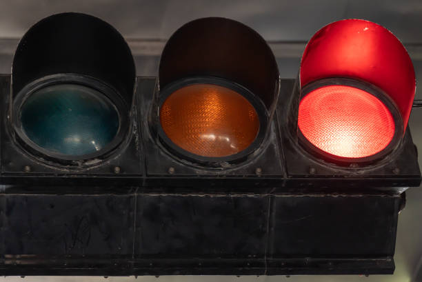 istock Horizontal vintage traffic light close-up. Metallic old-fashioned stoplight. 2194568448