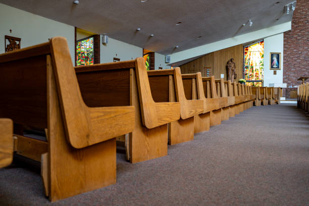 istock Wooden seating area inside a church 2194570466