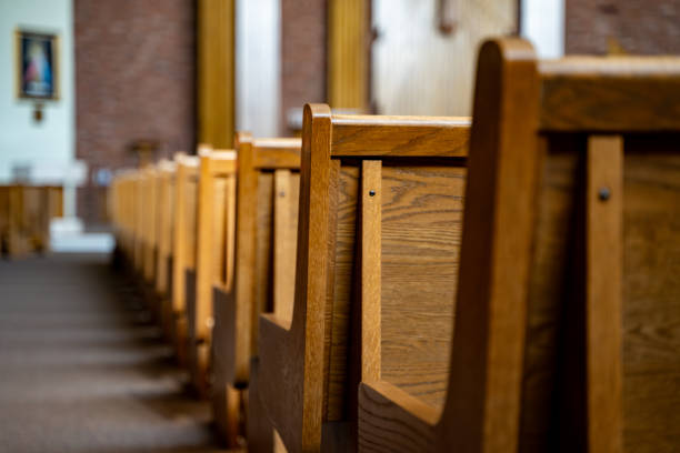 Wooden seating area inside a church.