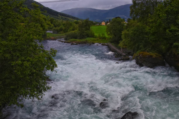 Olden Norway 2024 hiking views towards Briksdal Glacier, Jostedal Glacier largest glacier on Europe's mainland. Glacial river flowing to Sognefjord. Scandinavia, Nordic.