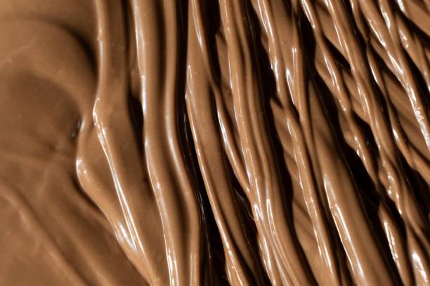 istock Real Melted Milk Chocolate Top View, Chocolate Texture. 2194575944