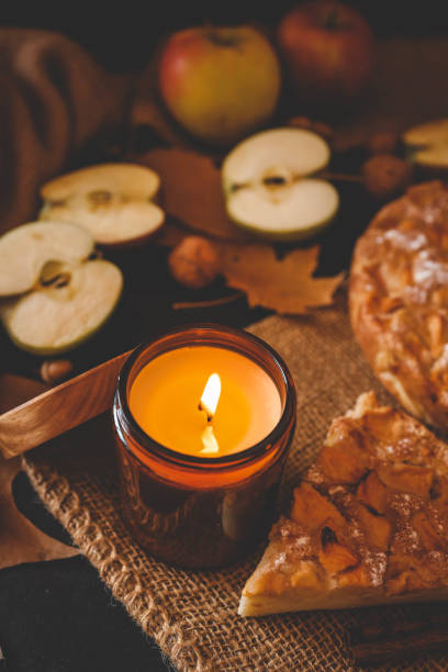 istock Candle and homemade apple pie, autumn mood 2194577343