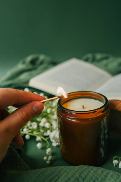 istock Girl lights a candle, spring aesthetics 2194578571