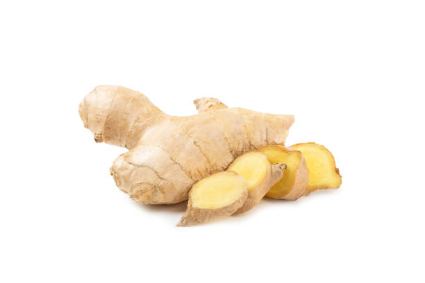 istock Fresh ginger isolated on white background. Sliced ​​ginger. Ginger root. Traditional alternative medicine, healing tea for immunity. Close-up. 2194580348