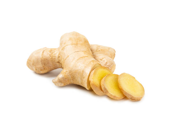 istock Fresh ginger isolated on white background. Sliced ​​ginger. Ginger root. Traditional alternative medicine, healing tea for immunity. Close-up. 2194580365