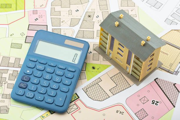 istock Imaginary cadastral map and general urban plan with cadastral parcels, urban destinations, vacant land plots and condominium residential building 2194581159