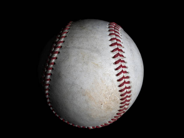 istock One baseball seen from the side isolated on black background 2194593912