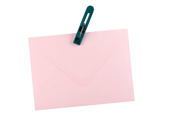 Blank pink envelope isolated on white background. Place for inscription, copy space.