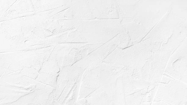 istock Texture of white plaster on a concrete wall handmade. Construction 2194605442