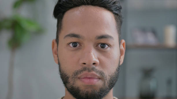 istock Close up of Serious Hispanic Man at Home 2194606544