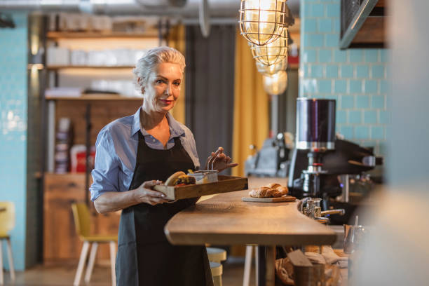 istock Elegant Caucasian Waitress in Local Bistro Setting 2194609209