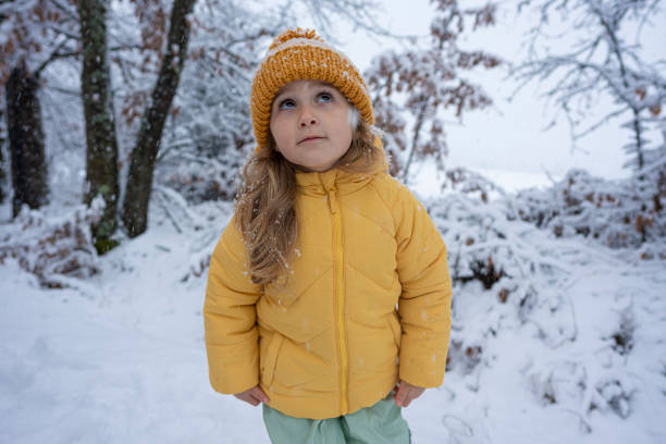 istock Child Development. Happy Child Exploring Snow In The Park 2194618194