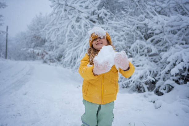 istock Winter Snow Fun. Child Making A Snowman 2194618250