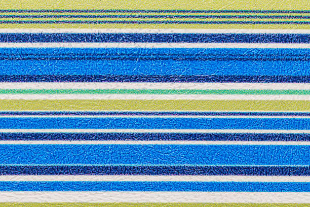 Blue, green, and yellow horizontal stripes with a crinkled surface, creating a visually appealing pattern with a mix of vibrant and pastel colors