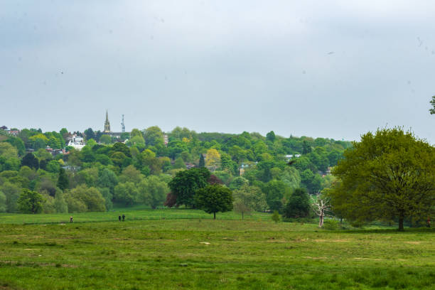 istock Springtime Panorama of Hampstead Heath in London with Lush Greenery 2194623323