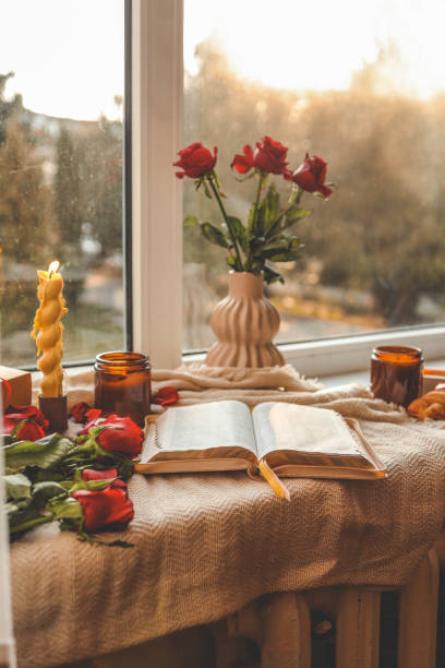 istock Open Bible in a cozy home interior. Good morning. 2194629179