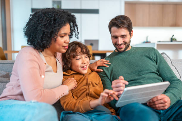 istock Diverse Family Enjoying Smart Home Technology Together 2194629791