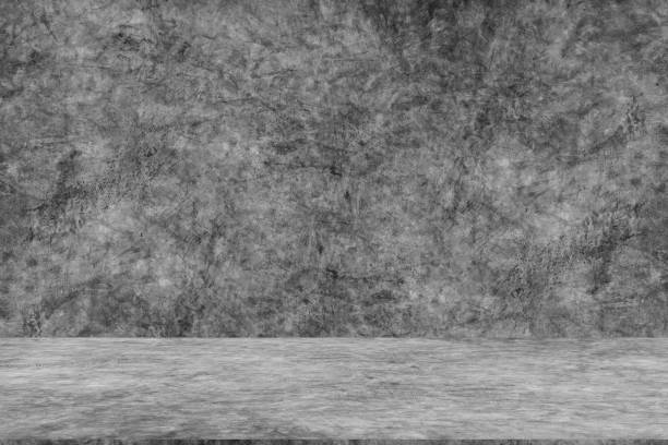 istock Background  wall cement for text insertion and presentation product in studio and wall backdrops show products.with shadow from window color tone  grey 2194632221