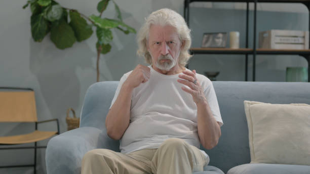 istock Angry Old Man Feeling Stressed at Home 2194632250