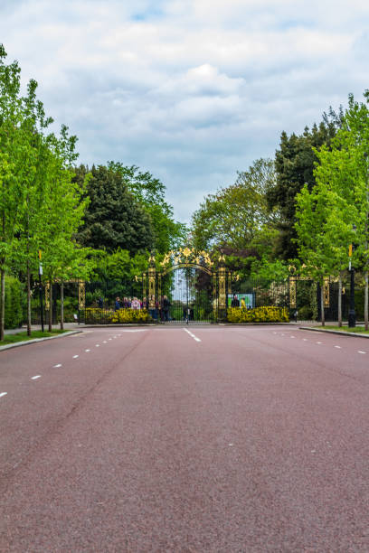 istock London Park Entrance Lined with Trees on an Overcast Day 2194635217
