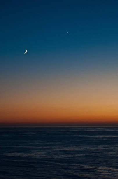 istock The moon, the sunset and the ocean 2194635245