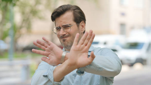 istock Rejecting Gesture by Tense Casual Young Man Outdoor 2194636354