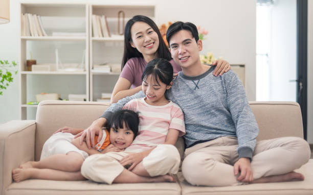 istock Young Asian family at home 2194637387