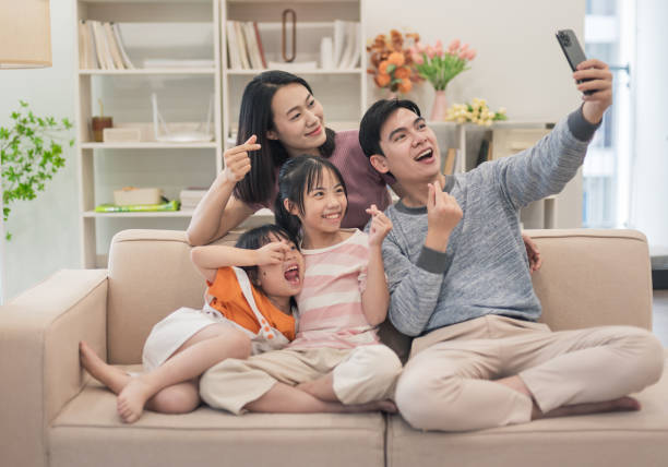 Young Asian family at home