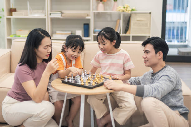 istock Young Asian family at home 2194637403