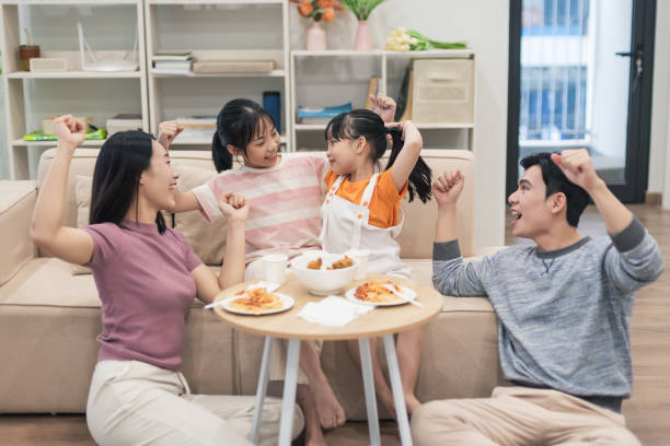 istock Young Asian family at home 2194637437