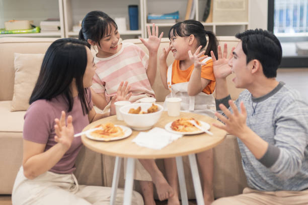 istock Young Asian family at home 2194637440