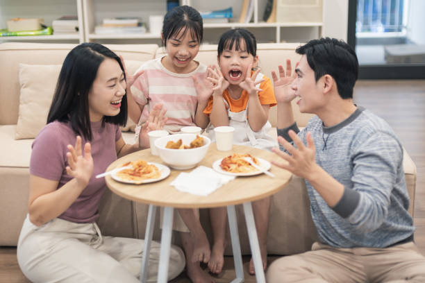 istock Young Asian family at home 2194637443