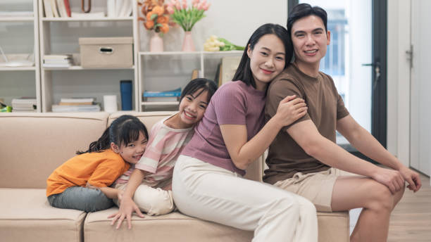 istock Young Asian family at home 2194637471