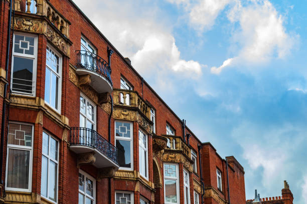 istock Historic Brick Architecture with Decorative Details and Iron Balconies 2194637672