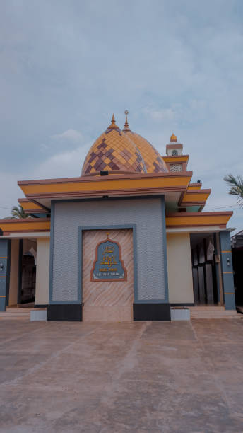 istock Stunning Mosque with Golden Dome and Decorative Entrance 2194641218