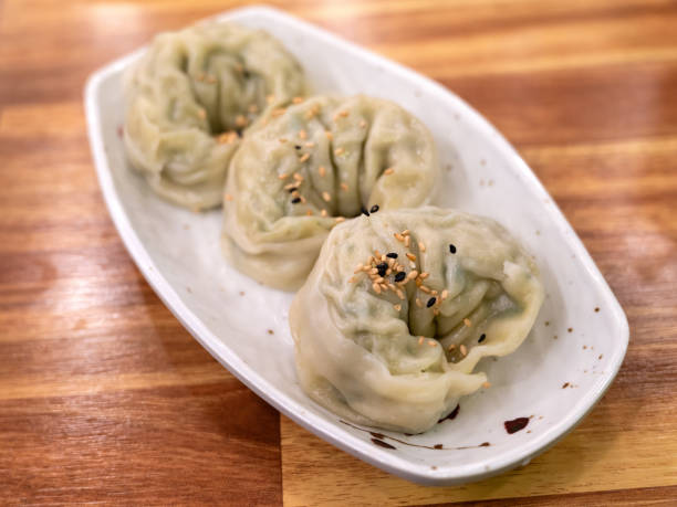istock Delicious steamed dumplings in South Korean restaurant. 2194655580