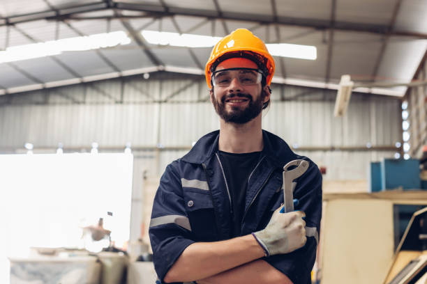 istock Workers Factory or Engineering work at factory site check up machine or products in site. Foreman or Technician checking Material or Machine on Plant. Heavy industry factory concept. 2194662921