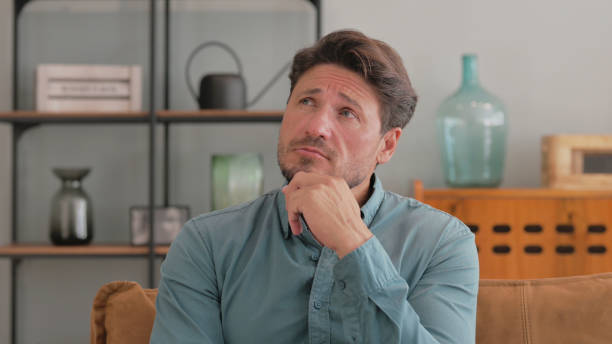 istock Portrait of Middle Aged Man Brainstorming while at Home 2194668547