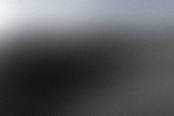 Grainy gradient carbon gray blurred abstract noise texture black and white monochrome plain background.\nBlack commonly associated with mourning, the end, secrets, magic, force, violence, fear, evil, and elegance. Grey or gray is an intermediate color between black and white. It is a neutral or achromatic color, meaning literally that it is without color because it can be composed of black and white. It is the color of a cloud-covered sky, of ash and of lead. Grey is the color commonly associated with neutrality, conformity, boredom, uncertainty, indifference, and modesty.