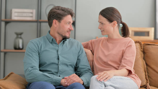 istock Young Man Talking with Wife at Home 2194677719
