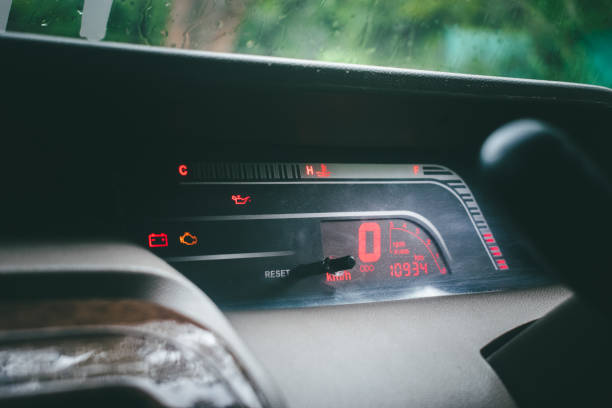 istock Close up view of the dashboard of a car with a speedometer. 2194683045