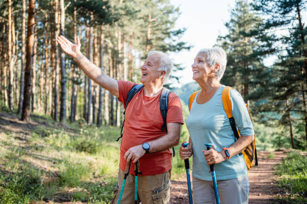 istock Senior couple hiking in the forest 2194685244