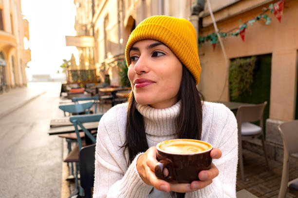 istock Woman sipping a coffee 2194685713