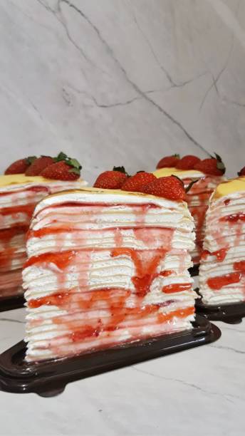 Mille Crêpes is a delicate French-inspired cake made from many thin crêpes layered with light pastry cream. Soft and creamy with a melt-in-the-mouth texture, this cake offers a refined, subtly sweet treat perfect for special occasions or afternoon tea. mille crêpes is a delicate french-inspired cake made from many thin crêpes layered with light pastry cream. soft and creamy with a melt-in-the-mouth texture, this cake offers a refined, subtly sweet treat perfect for special occasions or afternoon tea.