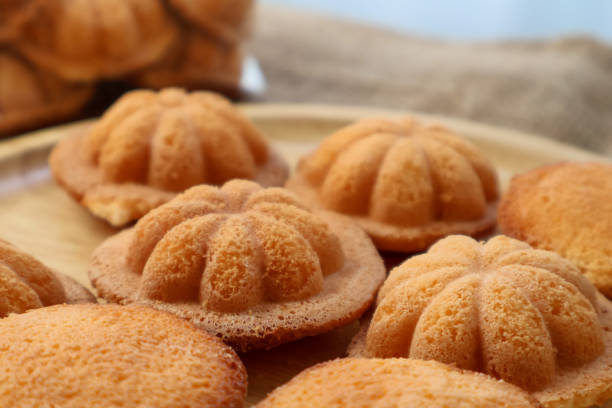 istock Side view Thai egg cake with or as it is known in Thai, Khanom Khai Made by baking.  Similar to French Madeleines 2194690626