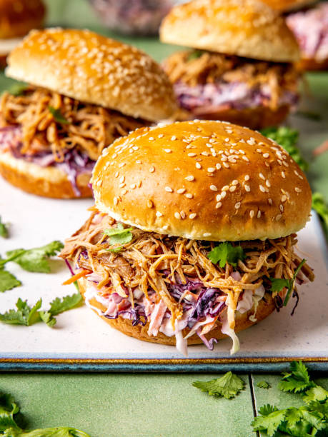 Slow cooked Pulled pork with coleslaw salad in a bun