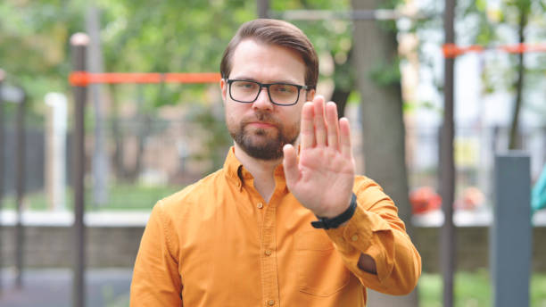 istock Stop Gesture by Young Man Outdoor 2194692926