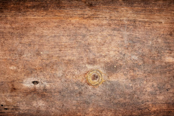Grunge old brown wood door textured background.