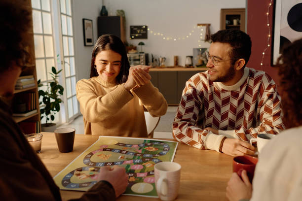 Woman Shaking Dice at Table