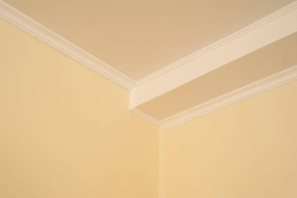 istock White ceiling molding. Corner part of room interior close up 2194703757